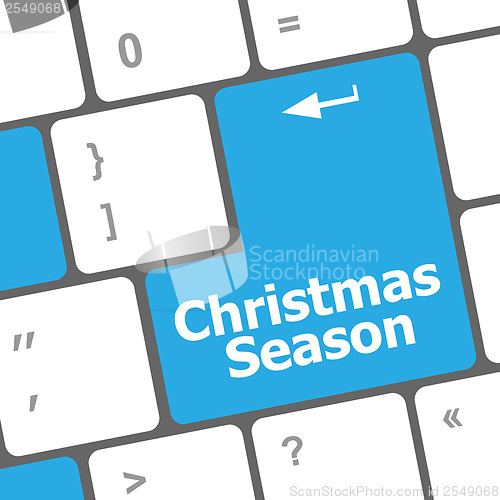 Image of Computer keyboard key with christmas season words