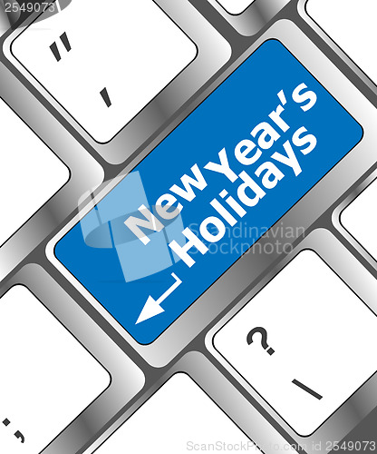 Image of Computer keyboard key with new year holidays words