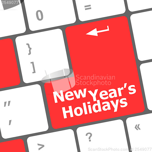 Image of Computer keyboard key with new year holidays words