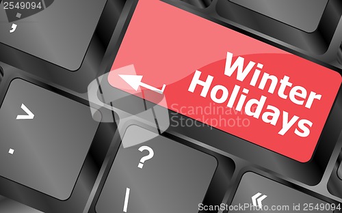 Image of Computer keyboard key with winter holidays words