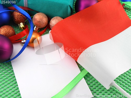 Image of Monaco flag with christmas decoration, new year card