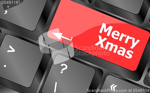 Image of merry christmas message, keyboard enter key button xmas