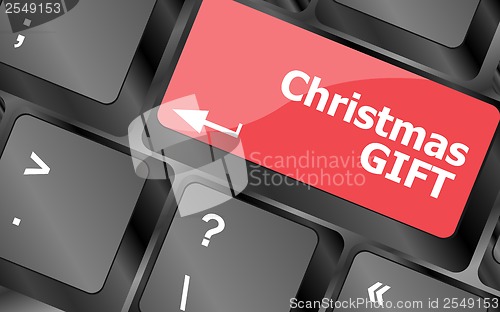 Image of Computer keyboard key with christmas gift words