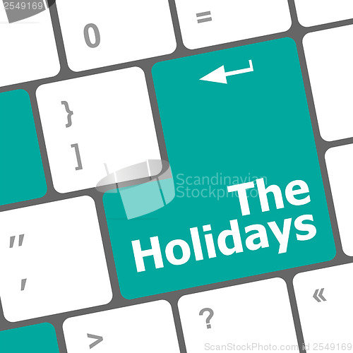 Image of the holidays button on modern internet computer keyboard key
