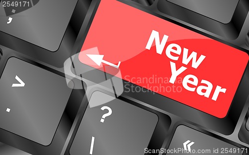 Image of happy new year message, keyboard enter key