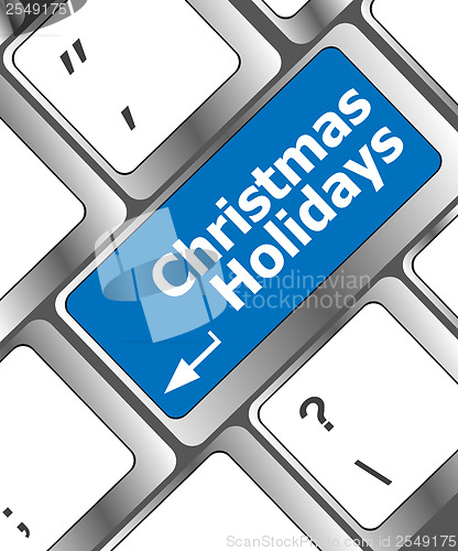 Image of Computer keyboard key with christmas holidays words