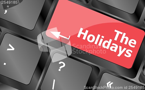 Image of the holidays button on modern internet computer keyboard key