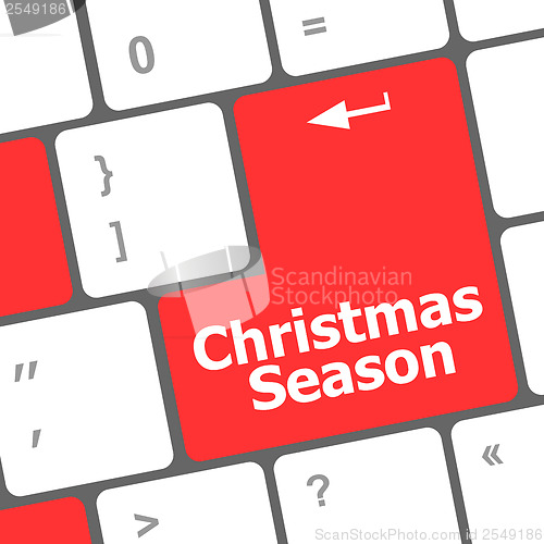 Image of Computer keyboard key with christmas season words