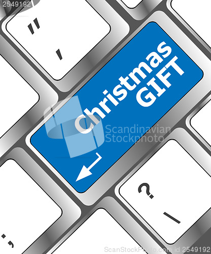 Image of Computer keyboard key with christmas gift words