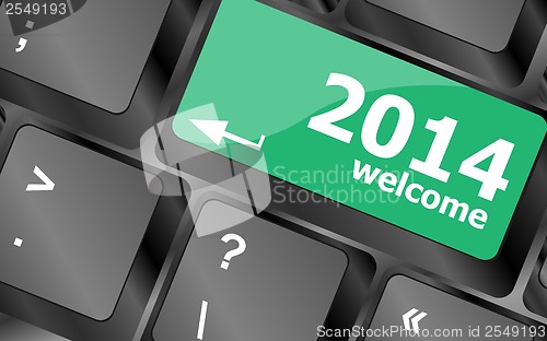Image of New year concept: welcome 2014 key on the computer keyboard