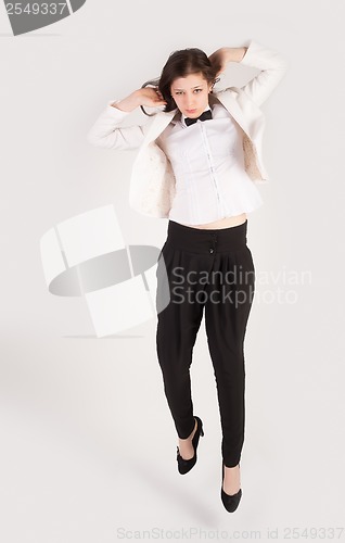 Image of Jumping business woman