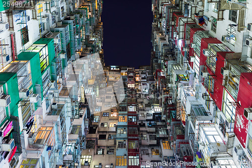 Image of Old residential building at night