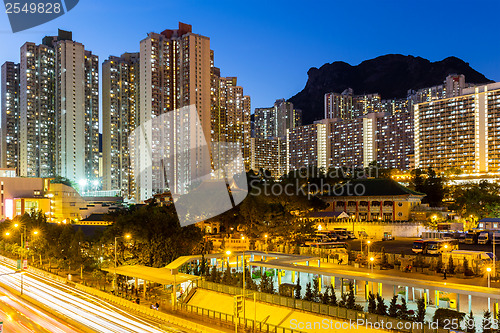 Image of Kowloon with lion rock at night