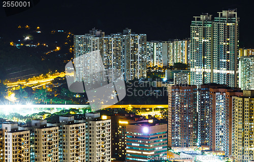 Image of apartment building in Hong Kong at night 