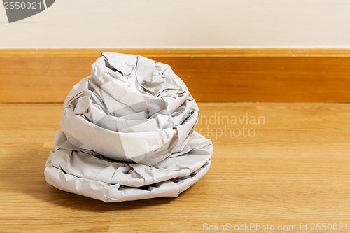 Image of Kitchen utensil wrapped by paper