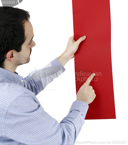 Image of Man holding a paper