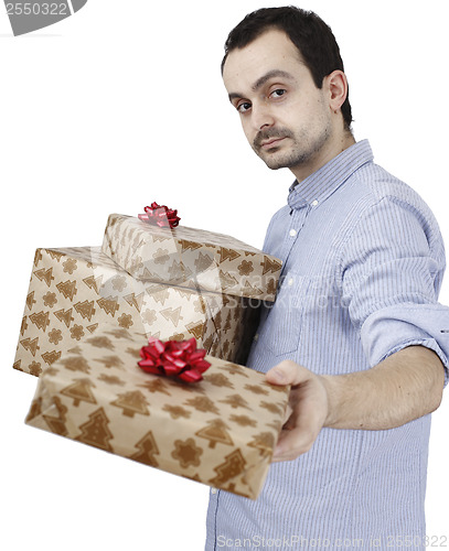 Image of Young man holding a present