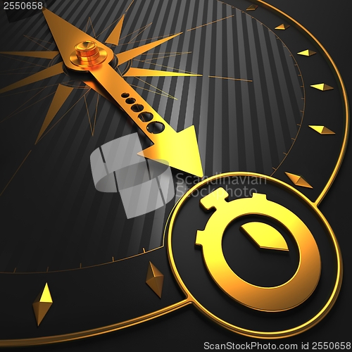Image of Golden Stopwatch Icon on Black Compass.
