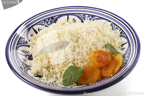 Image of Plan couscous garnished side view
