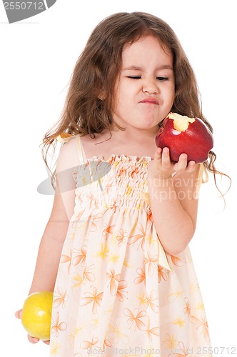 Image of Little girl with apple