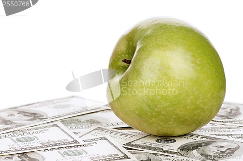 Image of Dollars and apple