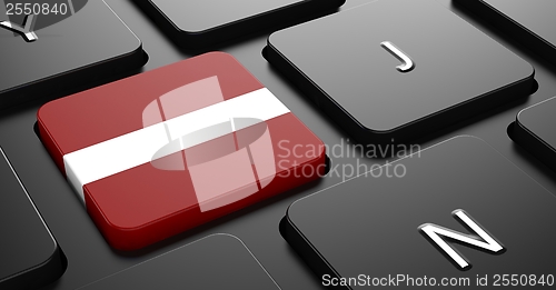 Image of Latvia - Flag on Button of Black Keyboard.
