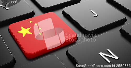 Image of China - Flag on Button of Black Keyboard.