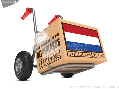 Image of Made in Netherlands - Cardboard Box on Hand Truck.