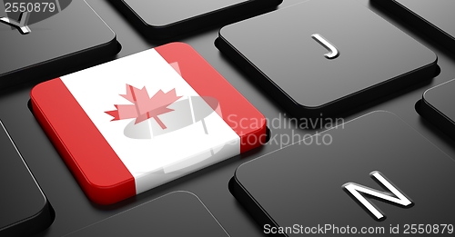 Image of Canada - Flag on Button of Black Keyboard.