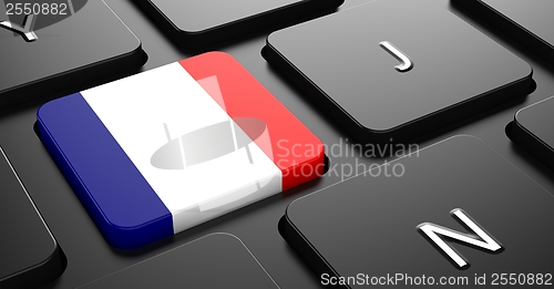 Image of France - Flag on Button of Black Keyboard.