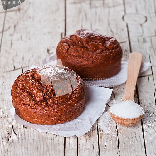 Image of fresh baked browny cakes and sugar