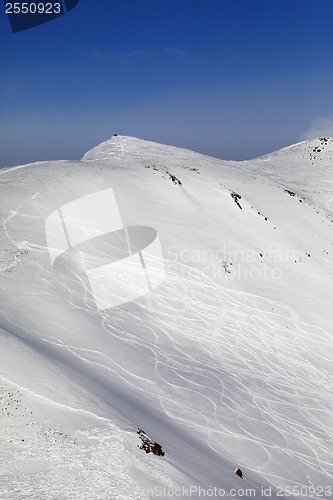 Image of Off-piste ski slope with traces