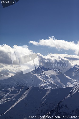 Image of Snowy mountains at evening