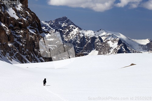 Image of Hiker in snowy mountains