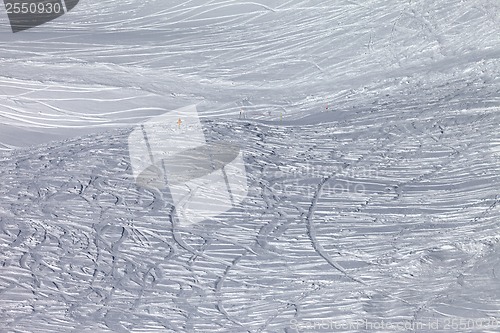 Image of Traces of skis and snowboards in new-fallen snow on off-piste sl