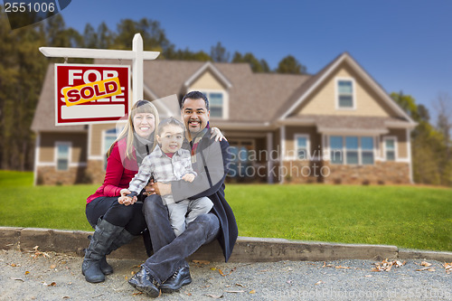 Image of Mixed Race Family, Home, Sold For Sale Real Estate Sign