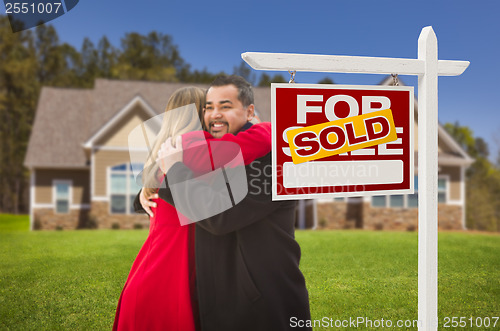 Image of Mixed Race Couple, House, Sold Real Estate Sign