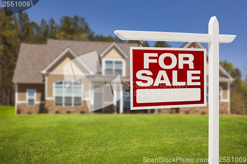 Image of Home For Sale Sign in Front of New House