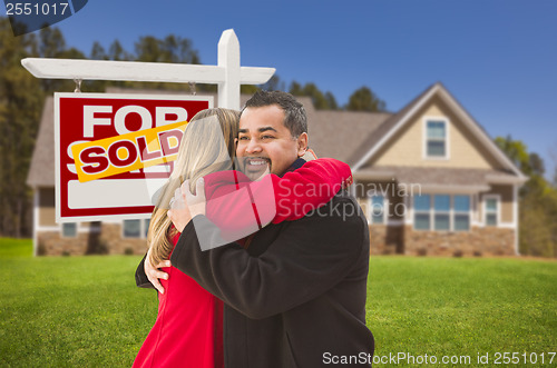 Image of Mixed Race Couple, House, Sold Real Estate Sign