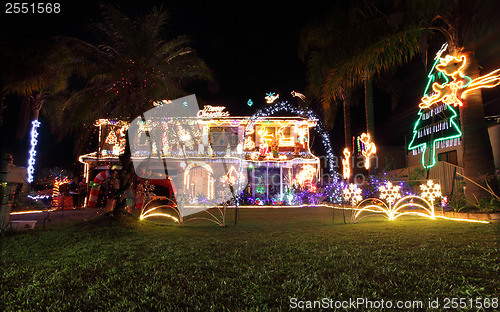 Image of Family house decorated with Christmas lights and decorations