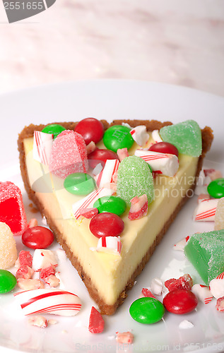 Image of Festive Christmas Cheesecake with assorted candies