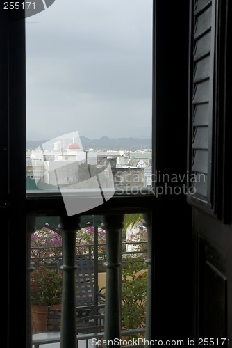 Image of old san juan through hotel window