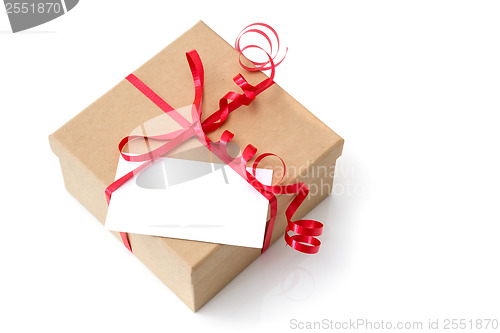 Image of Gift box with red ribbon and blank card