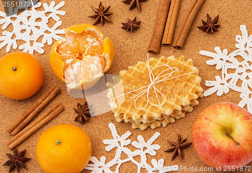 Image of Christmas spices, fruits and waffles