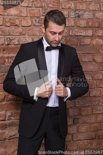 Image of Elegant macho man in a bow tie