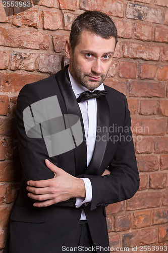 Image of Elegant macho man in a bow tie