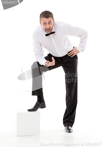 Image of Stylish man in a bow tie talking to the camera