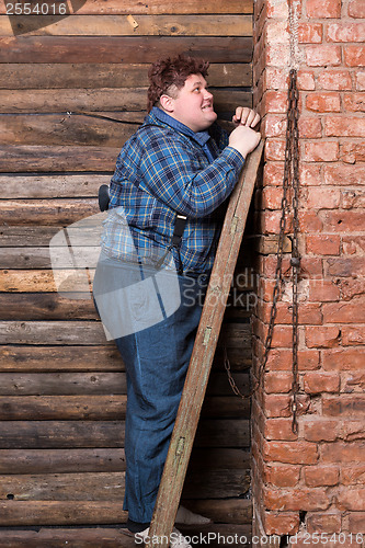 Image of Happy overweight young man