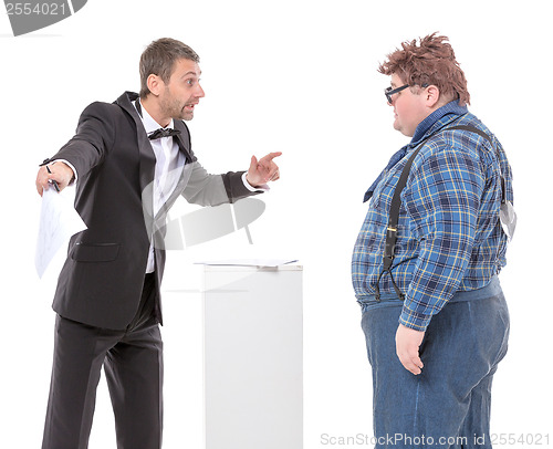 Image of Elegant man arguing with a country yokel