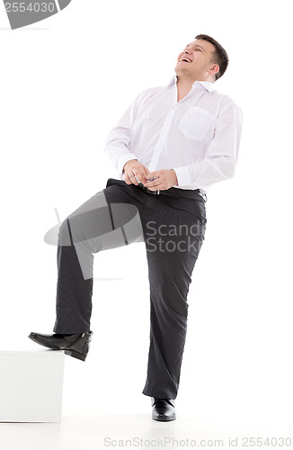 Image of Stylish man laughs